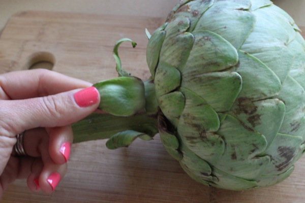 peel off Artichoke leaves